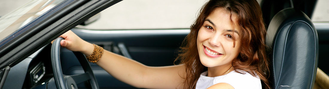 lady smiling sitting in car